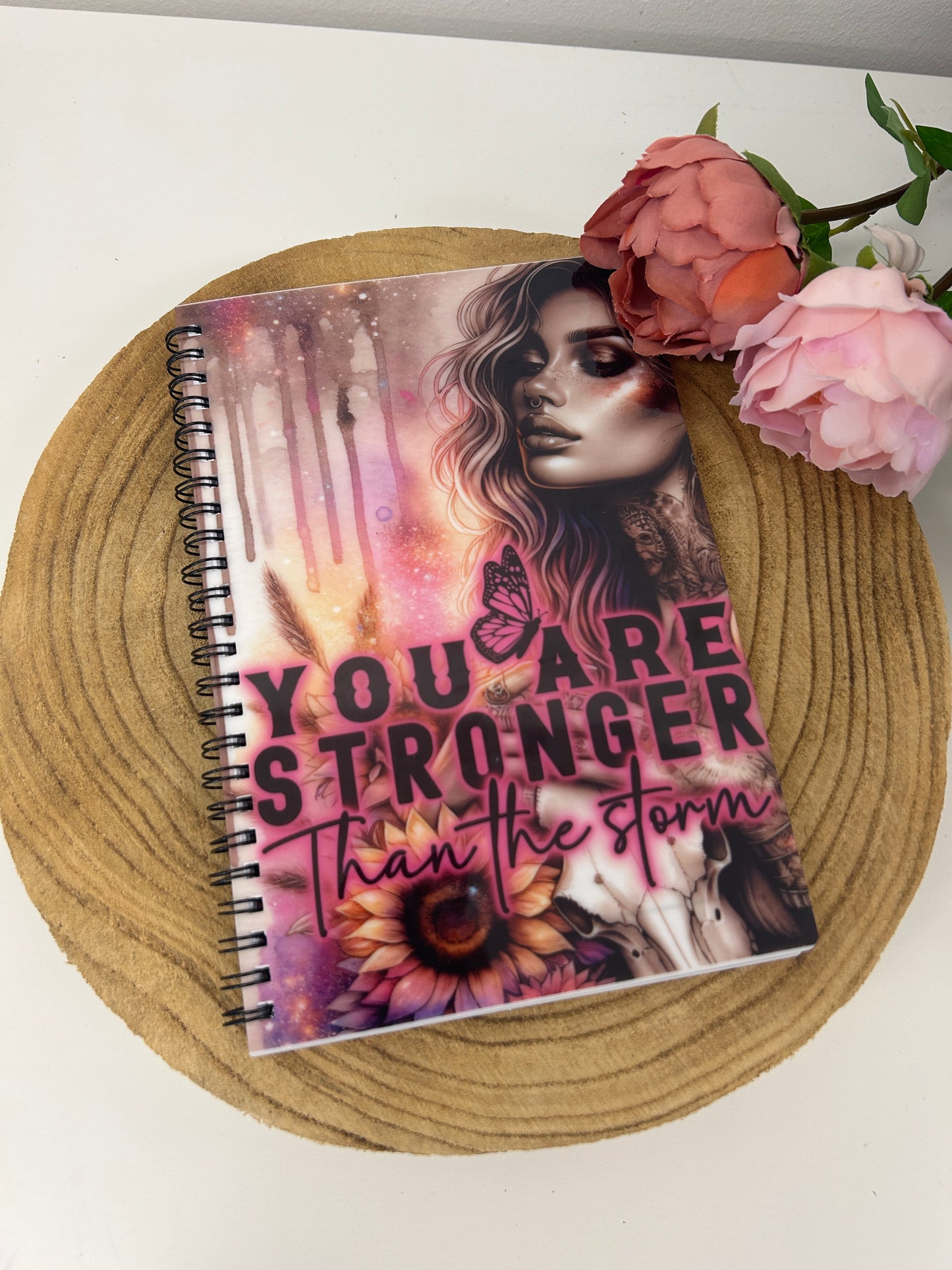 'You are stronger than the storm' notebook