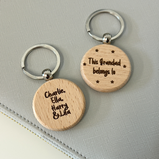 wooden keyring engraved with this grandad belongs to and added names on the reverse