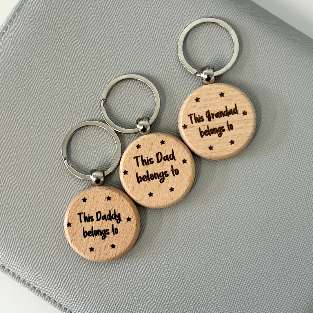 wooden keyring engraved with this grandad belongs to and added names on the reverse
