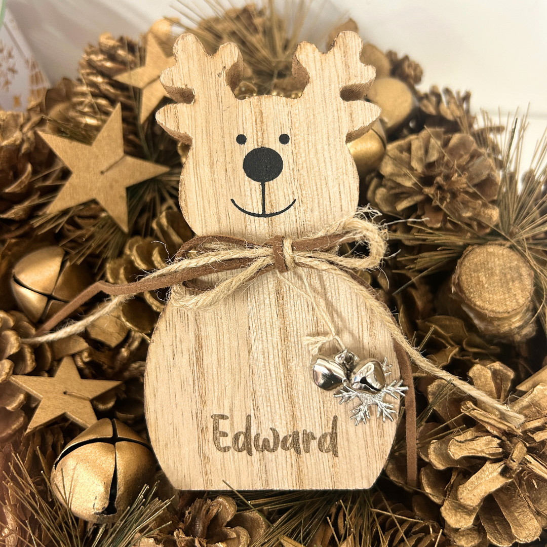 Freestanding reindeer with bell