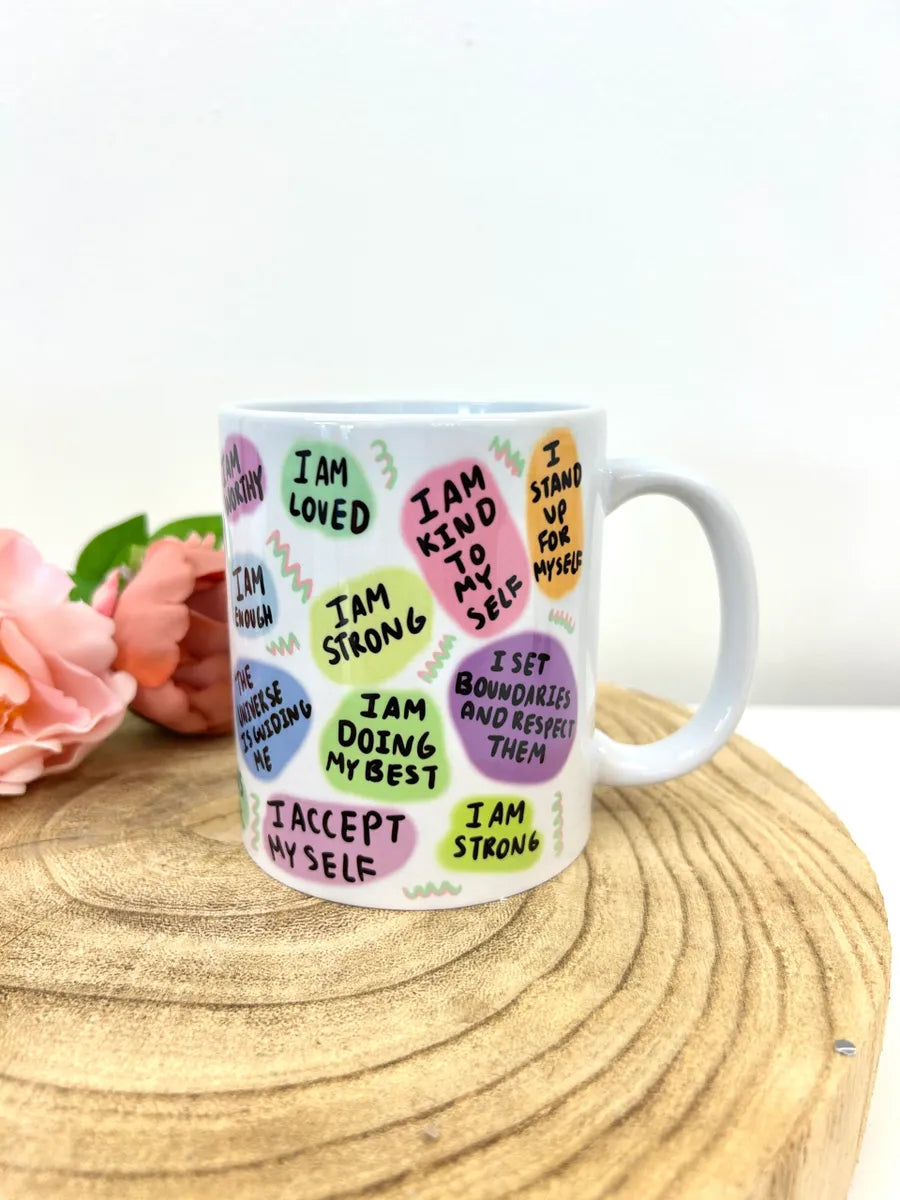 white ceramic mug printed with self love quotes